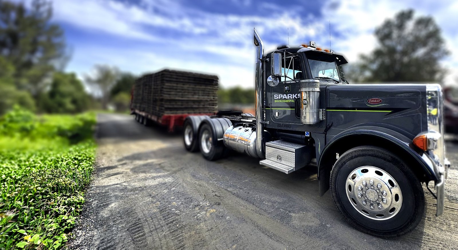 Sparks Environmental truck hauling ground-protection mats